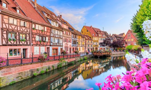 Colmar, Alsace, France. Petite Venice, water canal and traditional half timbered houses.